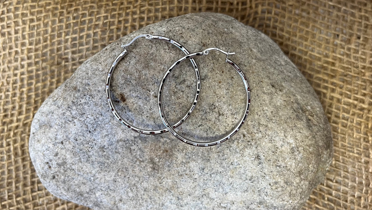 Boucles d'oreilles taille diamant