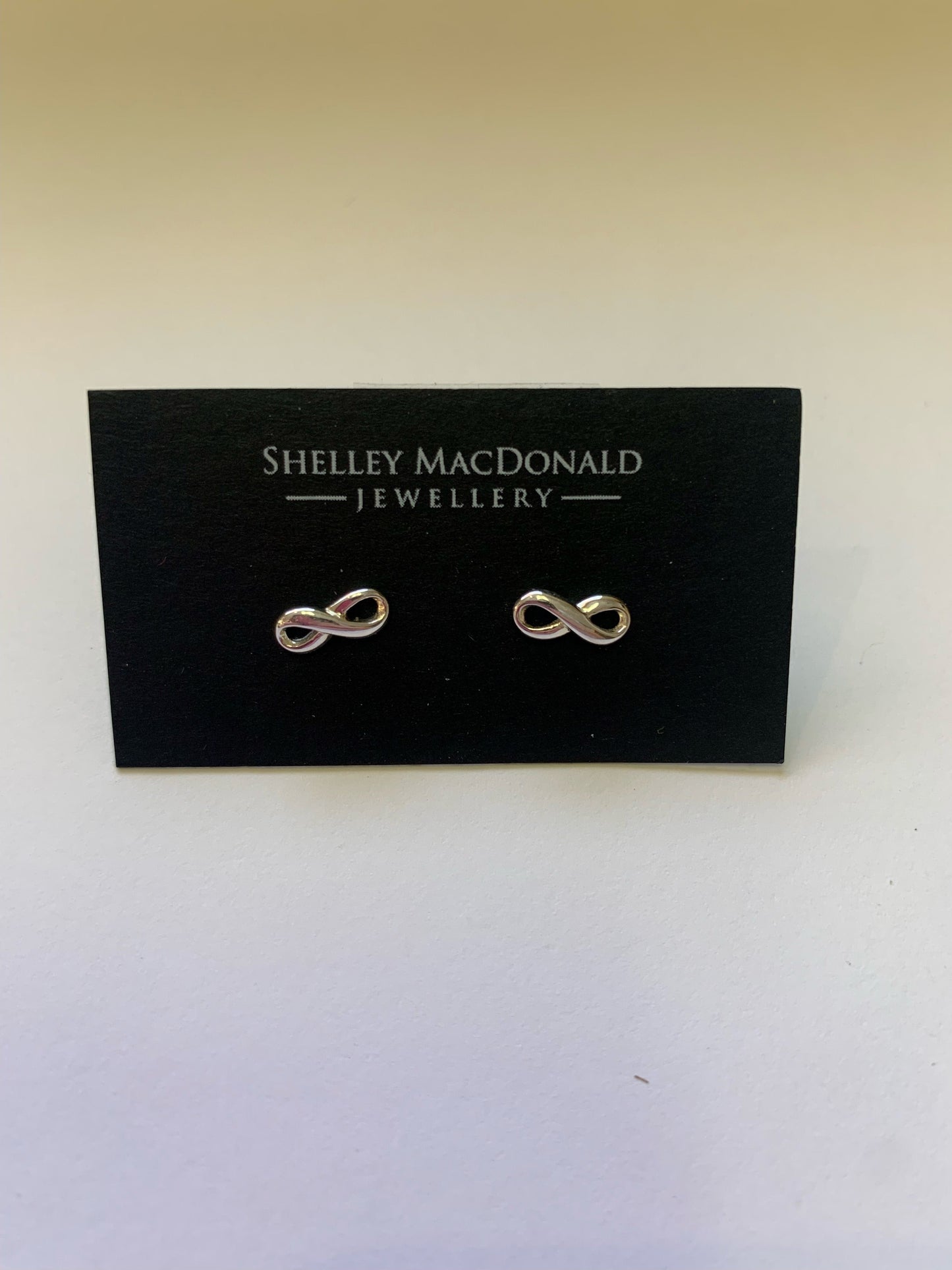Boucles d'oreilles clous infini