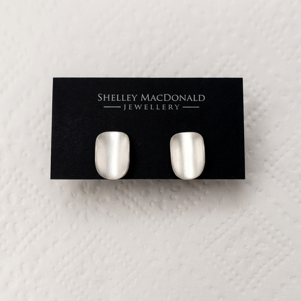Improved Curved Stud Earrings with Silk Finish photo